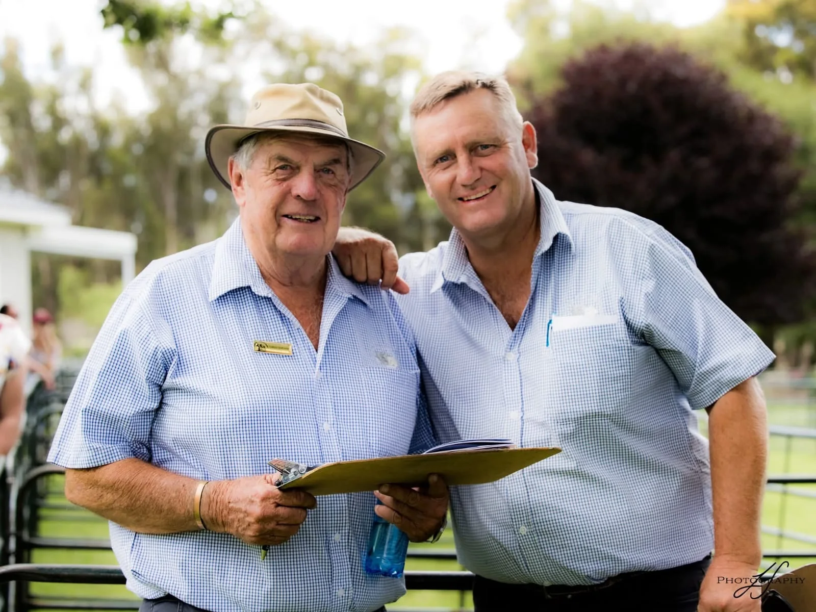 Chris and Ian Sheard standing together at a Sheard auction